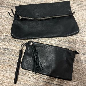 Two leather Barney New York clutch/wristlet